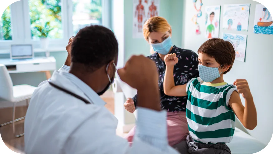 a person and a child wearing masks