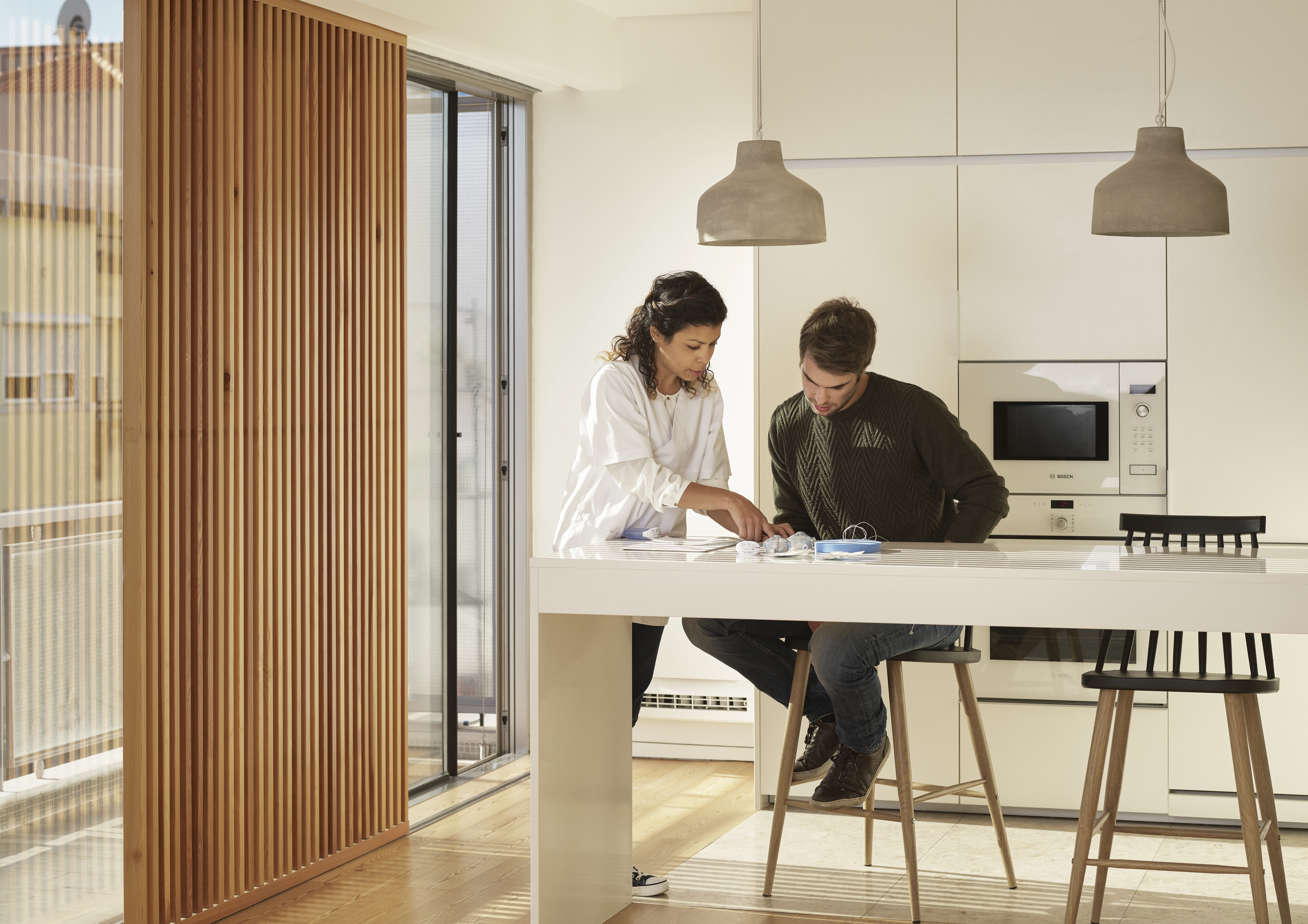 a man and a woman sitting at a table