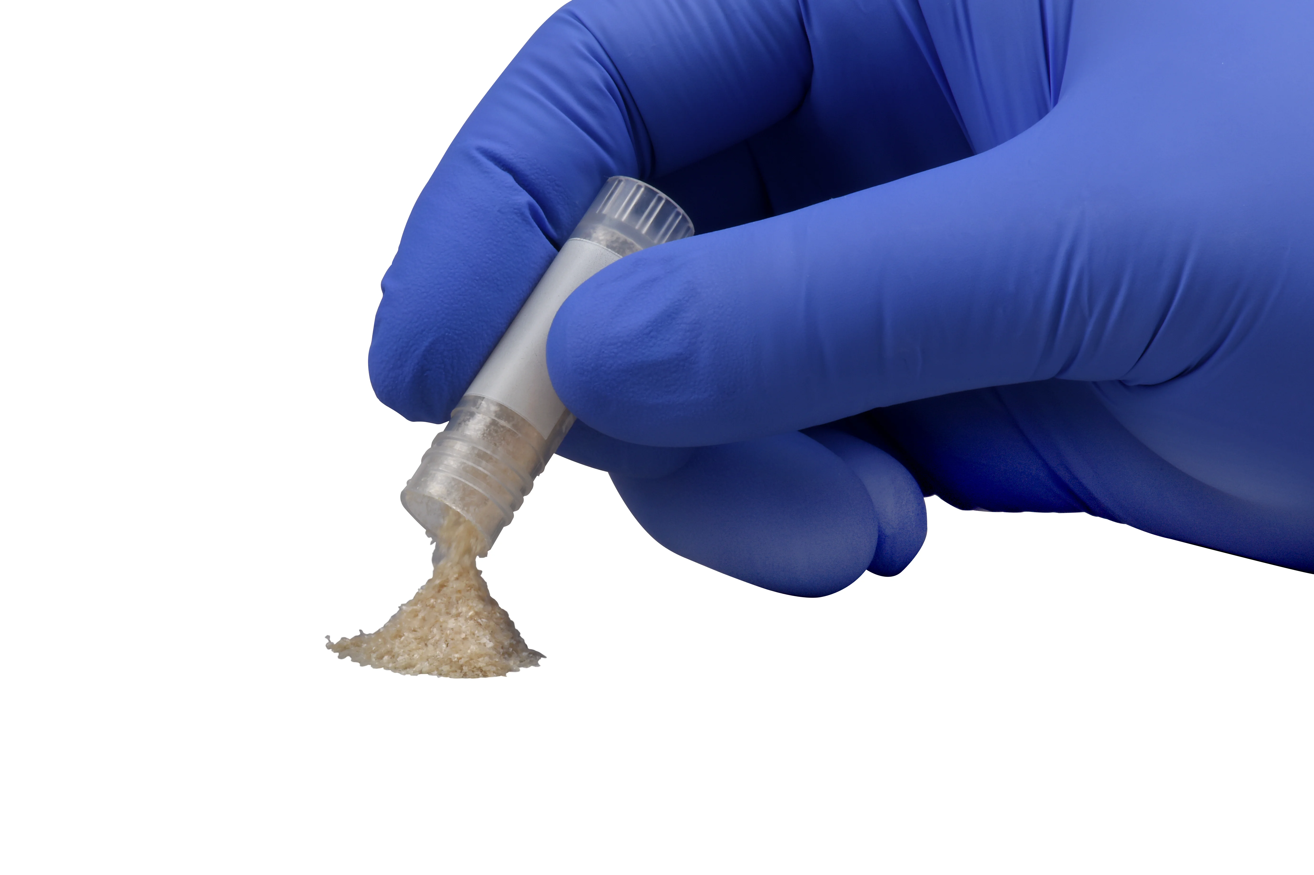 a person wearing a blue glove and a blue glove holding a pipe