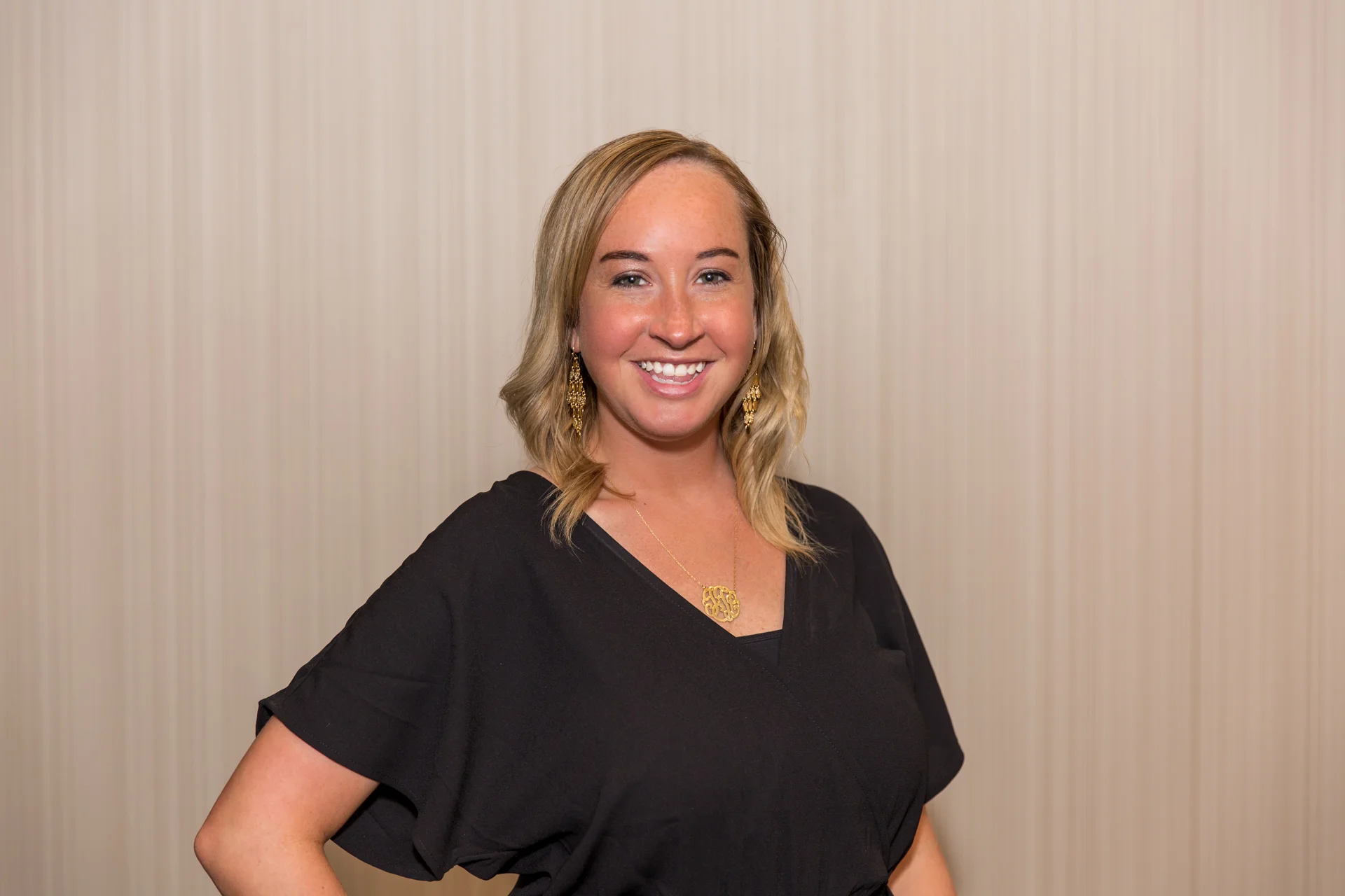 a woman smiling for the camera